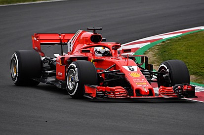 Vettel puts Ferrari on top on second day of testing