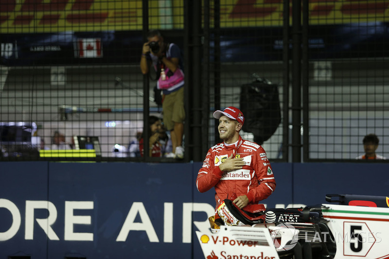 Pole sitter Sebastian Vettel, Ferrari celebrates in parc ferme