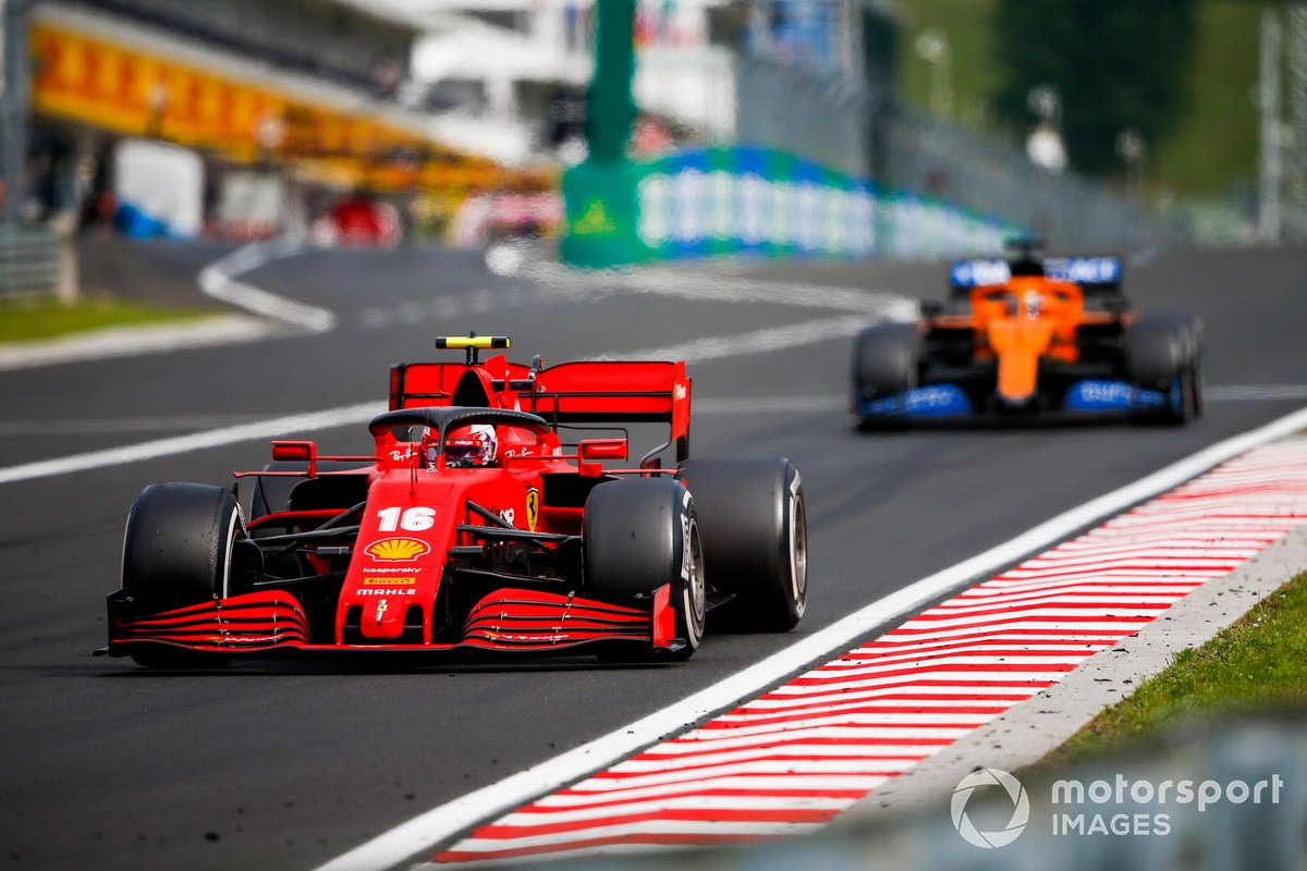 Charles Leclerc, Ferrari SF1000, leads Carlos Sainz Jr., McLaren MCL35