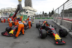 The crashed cars of Daniel Ricciardo, Red Bull Racing RB14 and Max Verstappen, Red Bull Racing RB14