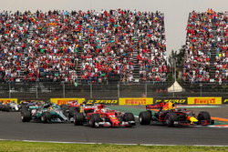 Max Verstappen, Red Bull Racing RB13 leads at the start of the race and collides with Sebastian Vett