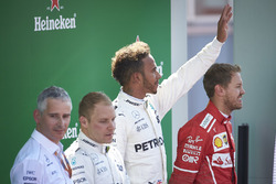 Second place Valtteri Bottas, Mercedes AMG F1, Race winner Third place Lewis Hamilton, Mercedes AMG F1 Sebastian Vettel, Ferrari, on the podium