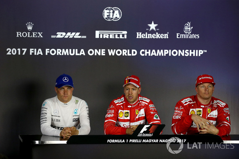 Conferenza stampa: il poleman Sebastian Vettel, Ferrari, il secondo qualificato Kimi Raikkonen, Ferrari, il terzo qualificato Valtteri Bottas, Mercedes-Benz F1