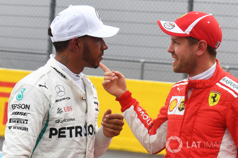 Polesitter Lewis Hamilton, Mercedes AMG F1, third place Sebastian Vettel, Ferrari