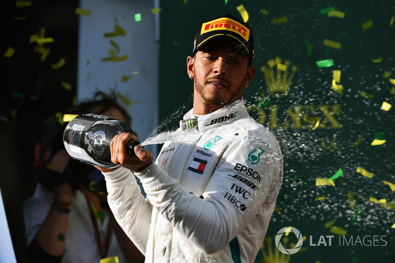 Lewis Hamilton, Mercedes-AMG F1 celebrates on the podium with the champagne