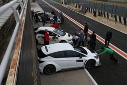 TCR cars in pitlane
