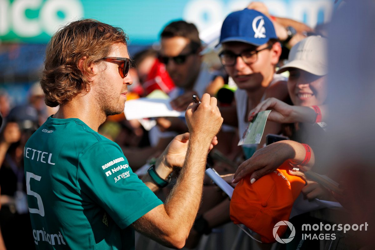 Sebastian Vettel, Aston Martin, signing autographs for fans