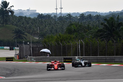 Kimi Raikkonen, Ferrari SF70H and Valtteri Bottas, Mercedes-Benz F1 W08