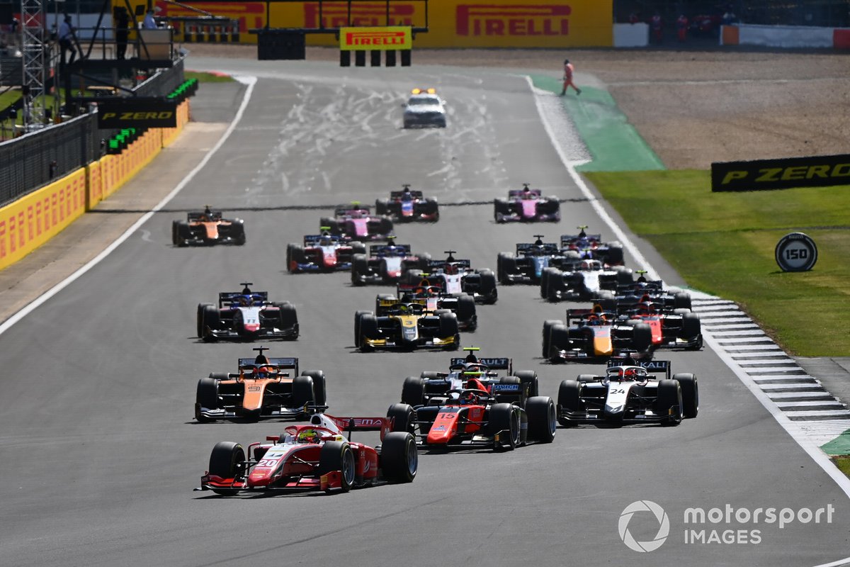 Mick Schumacher, Prema Racing, leads Felipe Drugovich, MP Motorsport, Nikita Mazepin, Hitech Grand Prix, Jack Aitken, Campos Racing, and the rest of the field at the start