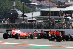 Sebastian Vettel, Ferrari SF16-H spins alongside team mate Kimi Raikkonen, Ferrari SF16-H at the start of the race