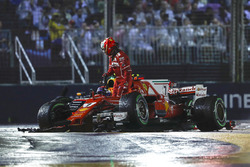 Kimi Raikkonen, Ferrari SF70H leaves his car after his collision, Max Verstappen, Red Bull Racing RB
