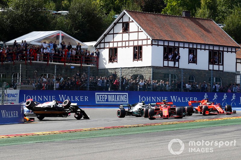 Charles Leclerc, Ferrari SF90, leads Sebastian Vettel, Ferrari SF90, Lewis Hamilton, Mercedes AMG F1 W10 and Valtteri Bottas, Mercedes AMG W10, as Kimi Raikkonen, Alfa Romeo Racing C38 is tipped into the air by Max Verstappen, Red Bull Racing RB15