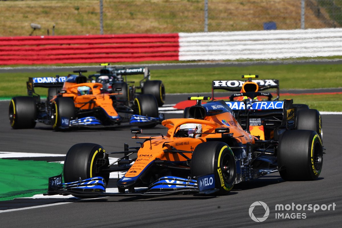 Lando Norris, McLaren MCL35M, Sergio Perez, Red Bull Racing RB16B, and Daniel Ricciardo, McLaren MCL35M