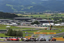 Kimi Raikkonen, Ferrari SF16-H leads Nico Hulkenberg, Sahara Force India F1 VJM09 at the start of the race