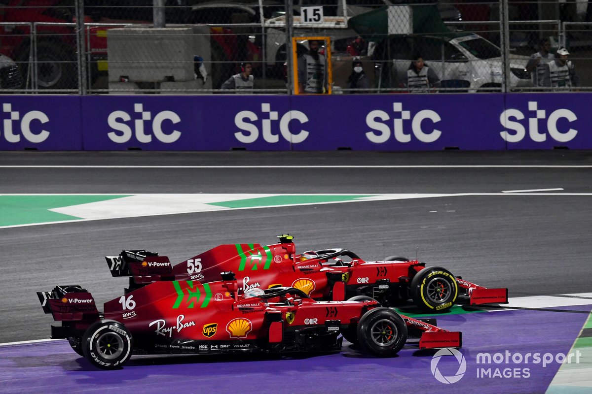 Charles Leclerc, Ferrari SF21, battles with Carlos Sainz Jr., Ferrari SF21