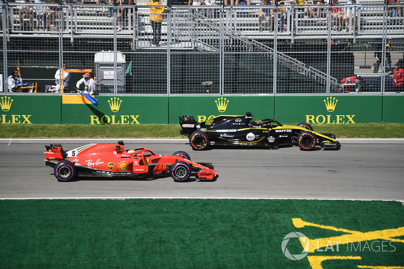 Ніко Хюлькенберг, Renault Sport F1 Team R.S. 18, та Себастьян Феттель, Ferrari SF71H