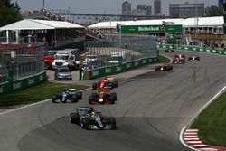 Lewis Hamilton, Mercedes-Benz F1 W08 leads as Valtteri Bottas, Mercedes-Benz F1 W08 and Max Verstappen, Red Bull Racing RB13 battle for position