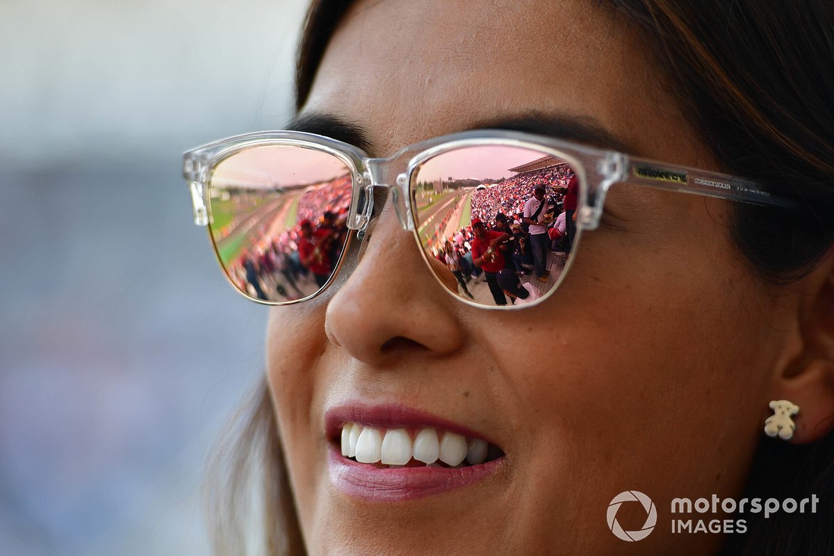 The track reflected in a fans glasses