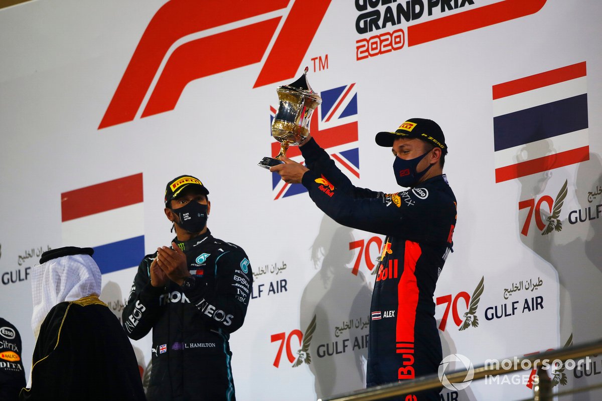 Alex Albon, Red Bull Racing, 3rd position, receives his trophy