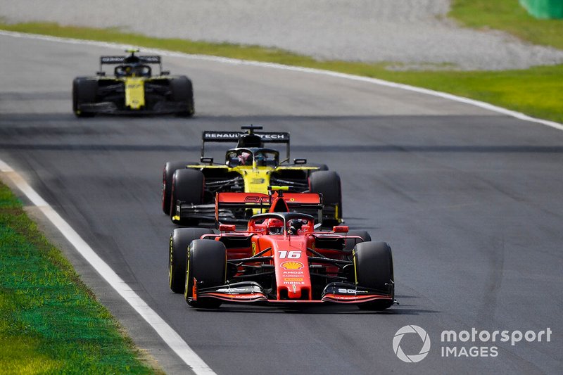 Charles Leclerc, Ferrari SF90, leads Daniel Ricciardo, Renault F1 Team R.S.19, and Nico Hulkenberg, Renault F1 Team R.S. 19