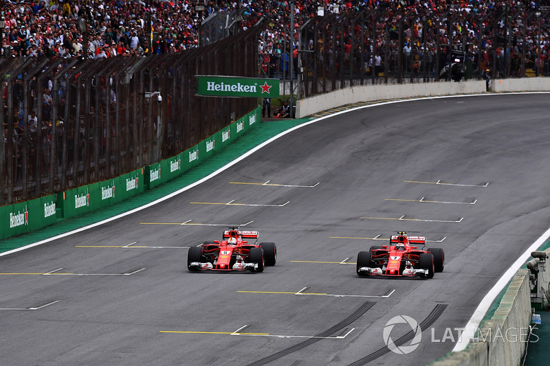 Sebastian Vettel, Ferrari SF70H and Kimi Raikkonen, Ferrari SF70H stop on the track after Qualifying