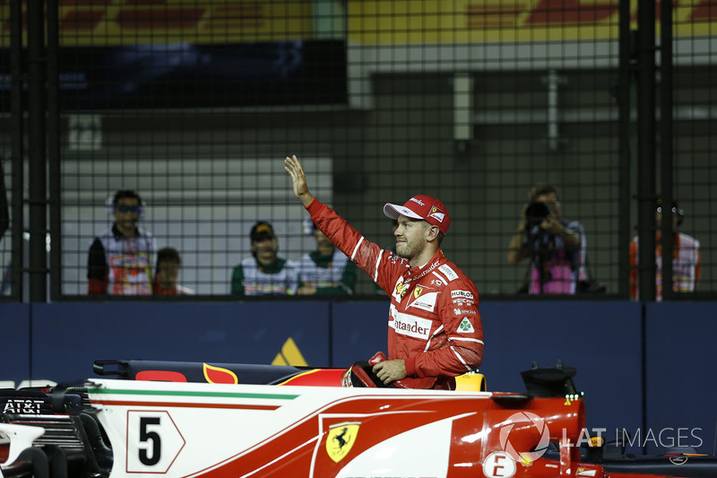 Pole sitter Sebastian Vettel, Ferrari celebrates in parc ferme
