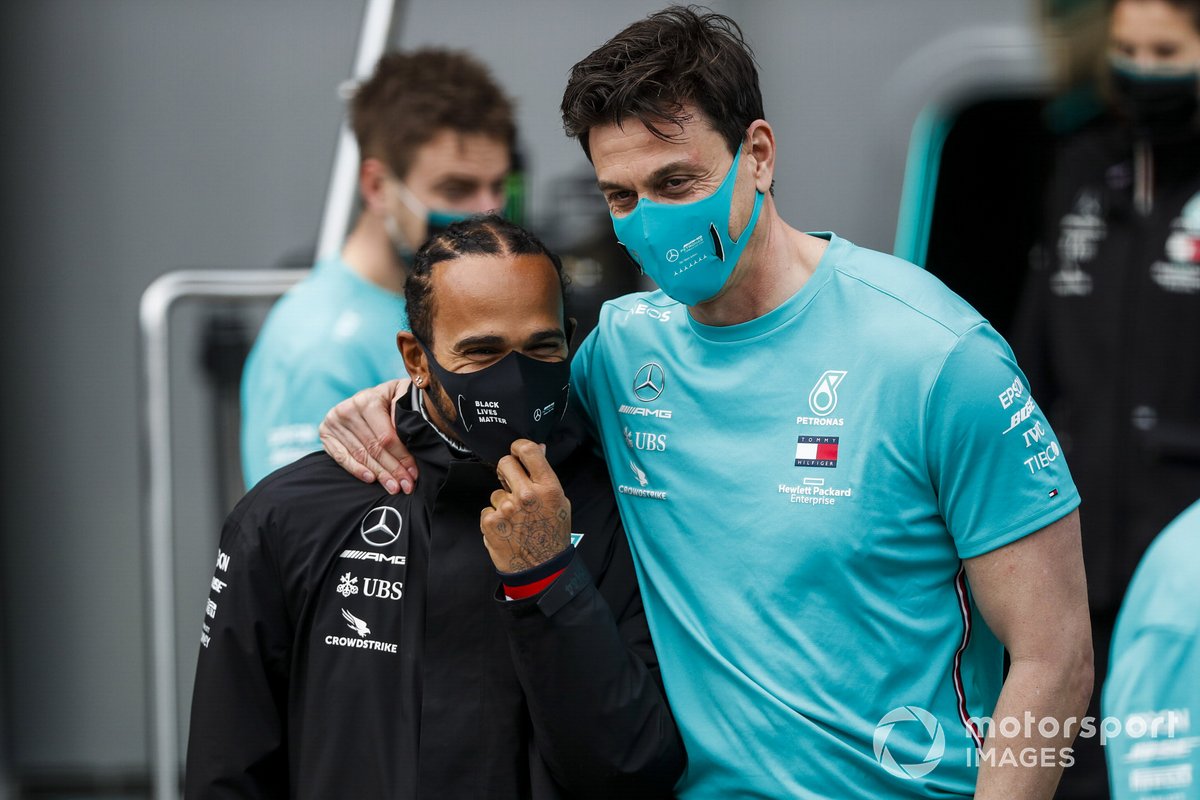 Lewis Hamilton, Mercedes-AMG F1, 1st position, and Toto Wolff, Executive Director (Business), Mercedes AMG, celebrate with their team after securing a 7th world drivers championship title