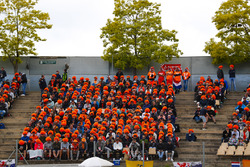 Dutch fans of Max Verstappen, Red Bull Racing RB14, wear orange wigs