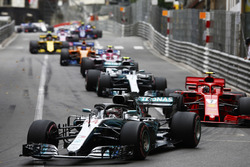 Lewis Hamilton, Mercedes AMG F1 W09, leads Kimi Raikkonen, Ferrari SF71H and Valtteri Bottas, Mercedes AMG F1 W09