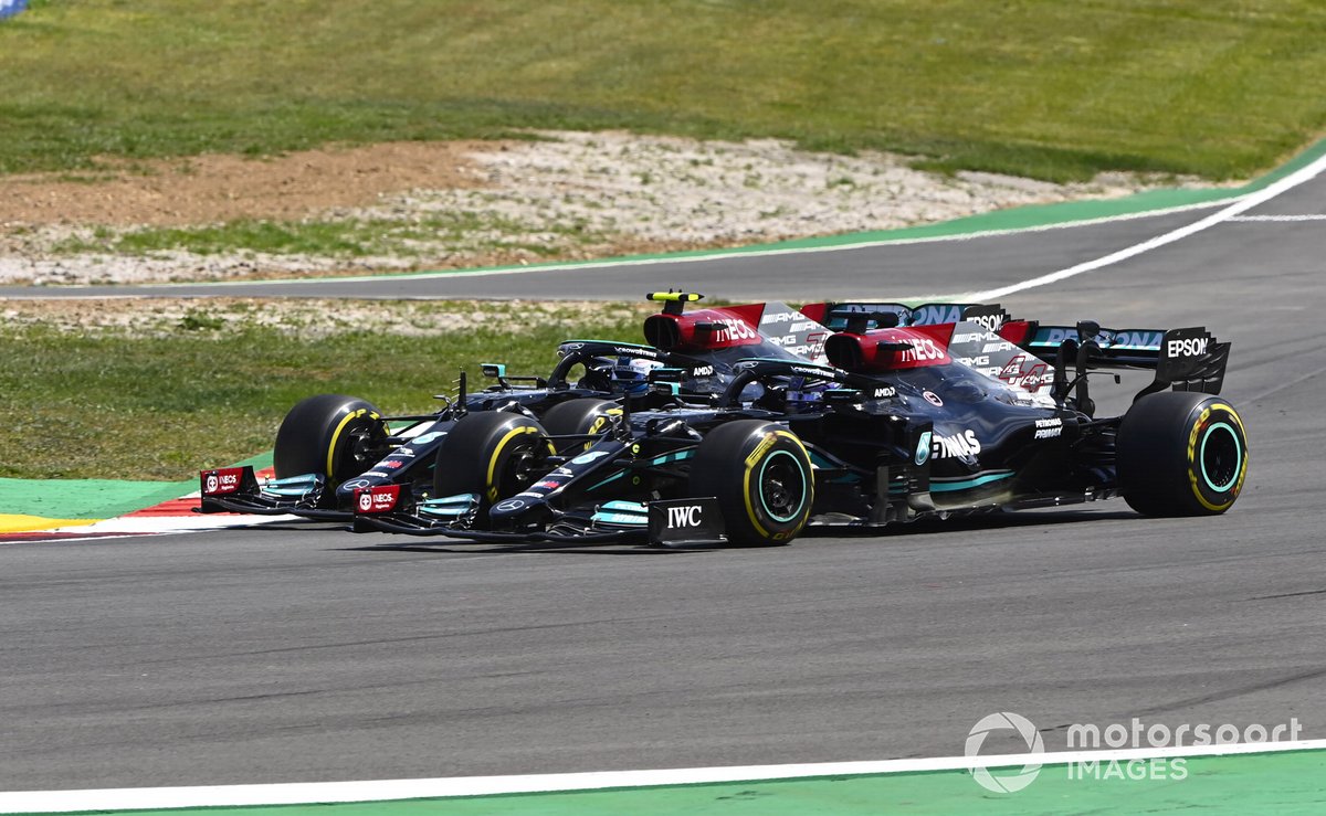 Lewis Hamilton, Mercedes W12, passes Valtteri Bottas, Mercedes W12