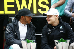 Lewis Hamilton, Mercedes AMG, celebrates victory with Valtteri Bottas, Mercedes AMG and team members
