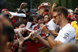 Jenson Button, McLaren signs autographs for fans