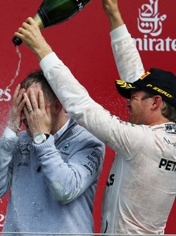 Nico Rosberg, Mercedes AMG F1 celebrates his second position with the champagne on the podium