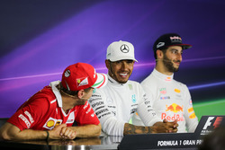 Sebastian Vettel, Ferrari, Lewis Hamilton, Mercedes AMG F1 and Daniel Ricciardo, Red Bull Racing in