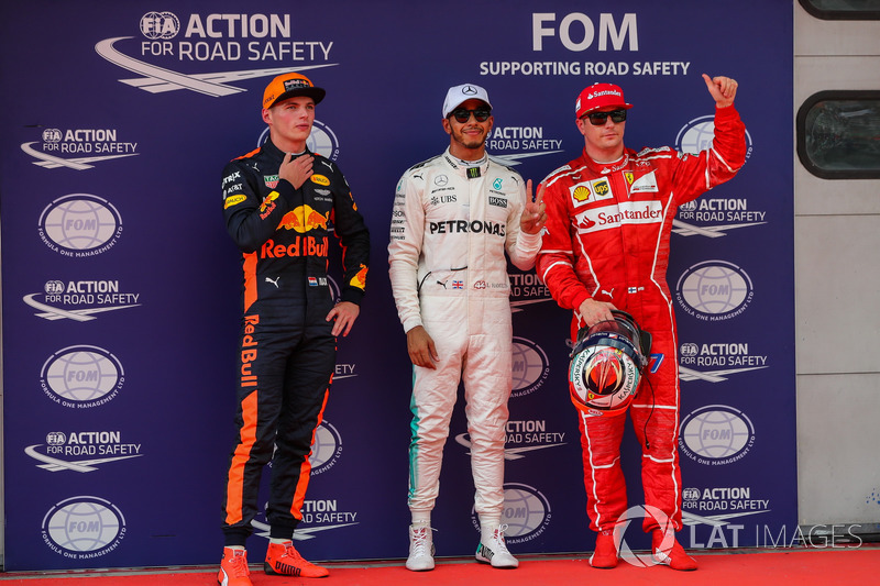 Pole sitter Lewis Hamilton, Mercedes AMG F1 celebrates in parc ferme, Max Verstappen, Red Bull Racing and Kimi Raikkonen, Ferrari