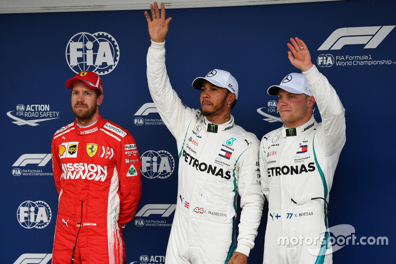 Sebastian Vettel, Ferrari, Lewis Hamilton, Mercedes AMG F1 and Valtteri Bottas, Mercedes AMG F1 celebrate in Parc Ferme