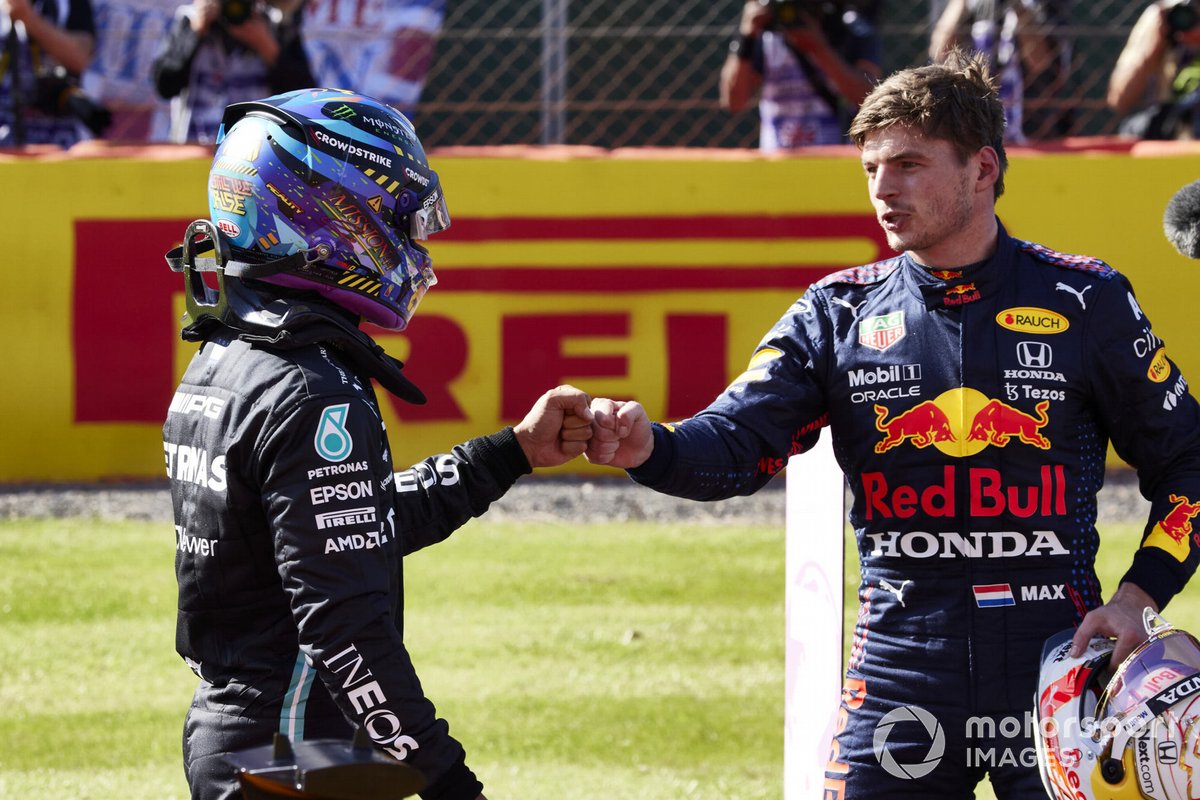 Lewis Hamilton, Mercedes, 2nd position, and Max Verstappen, Red Bull Racing, 1st position, congratulate each other
