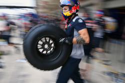 Red Bull Racing mechanic and Pirelli tyre