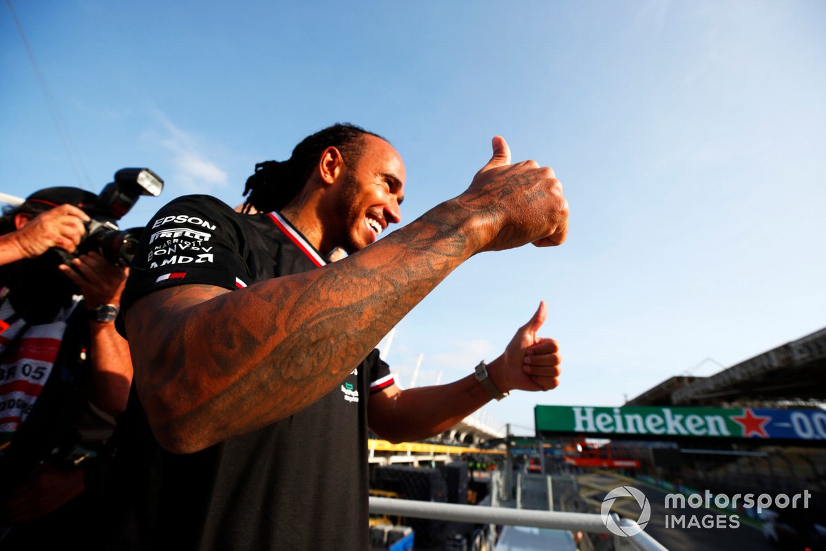 Lewis Hamilton, Mercedes W12, 1st position, celebrates with fans after the race