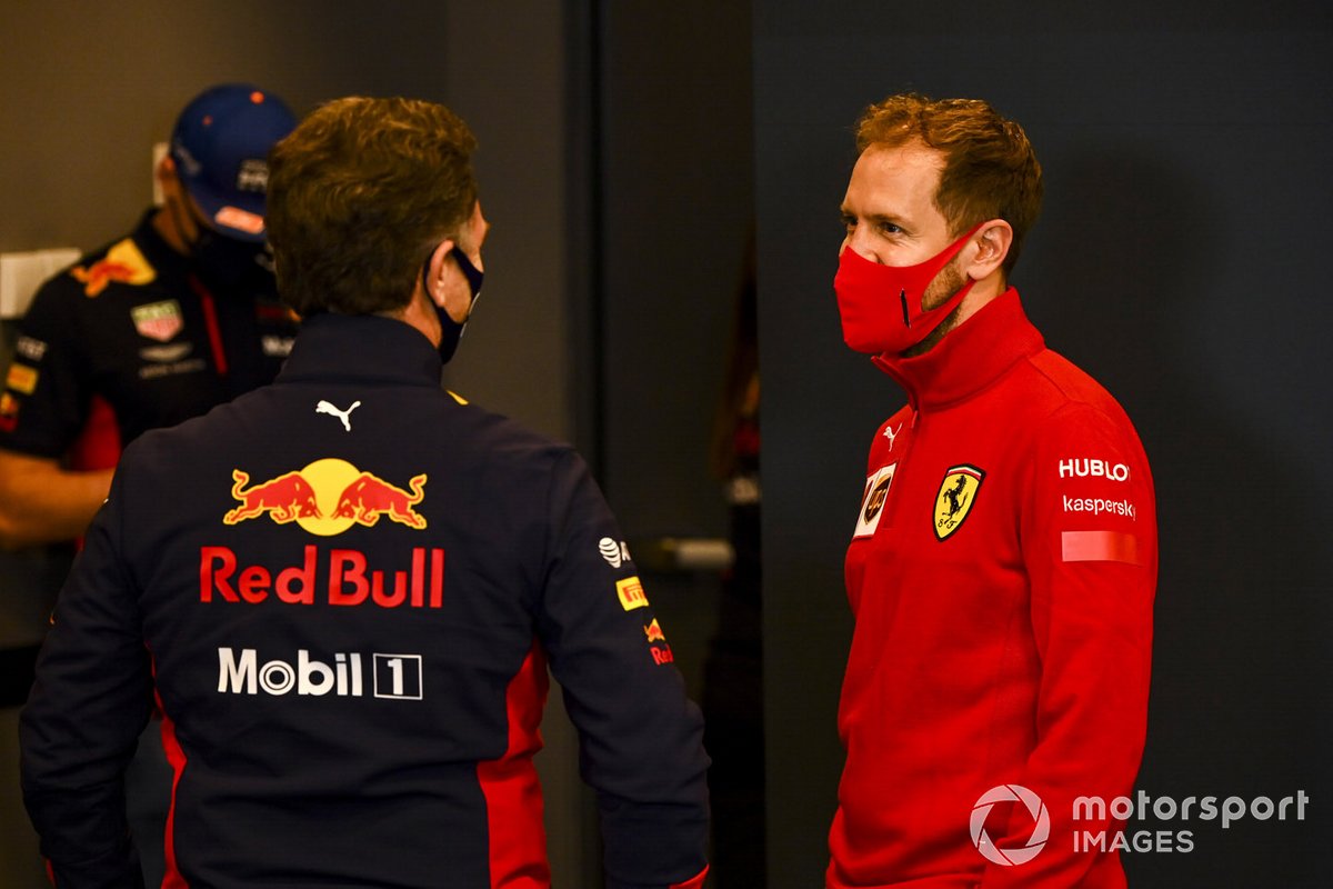 Christian Horner, Team Principal, Red Bull Racing and Sebastian Vettel, Ferrari talk in the press conference