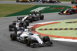 Felipe Massa, Williams FW38 Mercedes, leads Fernando Alonso, McLaren MP4-31 Honda, and Nico Hulkenberg, Force India VJM09 Mercedes