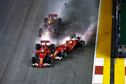 Sparks fly as Kimi Raikkonen, Ferrari SF70H hits Max Verstappen, Red Bull Racing RB13 and Sebastian