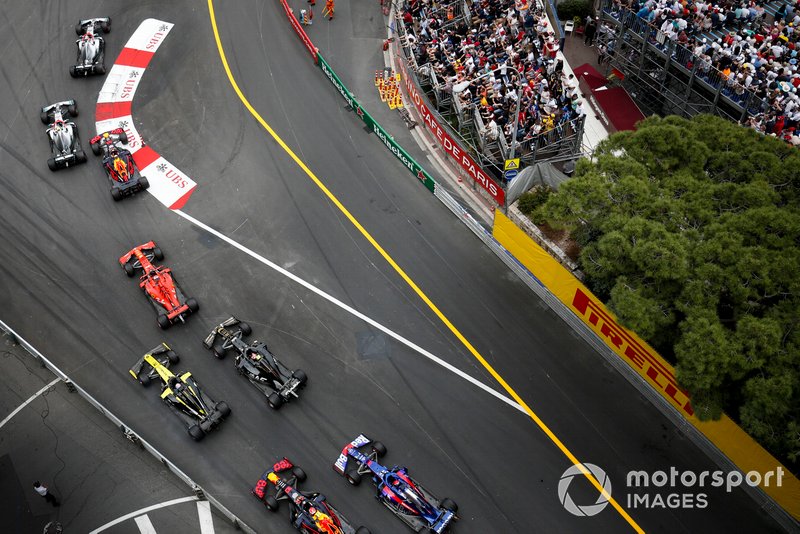 Lewis Hamilton, Mercedes AMG F1 W10, leads Valtteri Bottas, Mercedes AMG W10, Max Verstappen, Red Bull Racing RB15, Sebastian Vettel, Ferrari SF90, Daniel Ricciardo, Renault R.S.19, Kevin Magnussen, Haas F1 Team VF-19, Pierre Gasly, Red Bull Racing RB15, and Daniil Kvyat, Toro Rosso STR14, at the start