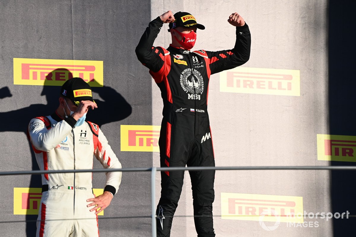 Nikita Mazepin, Hitech Grand Prix, 1st position, and Luca Ghiotto, Hitech Grand Prix, celebrate on the podium