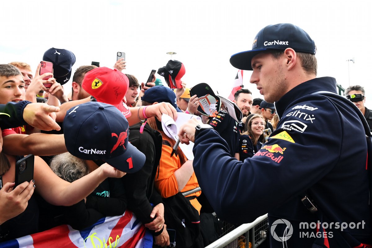 Max Verstappen, Red Bull Racing, signs autographs for fans