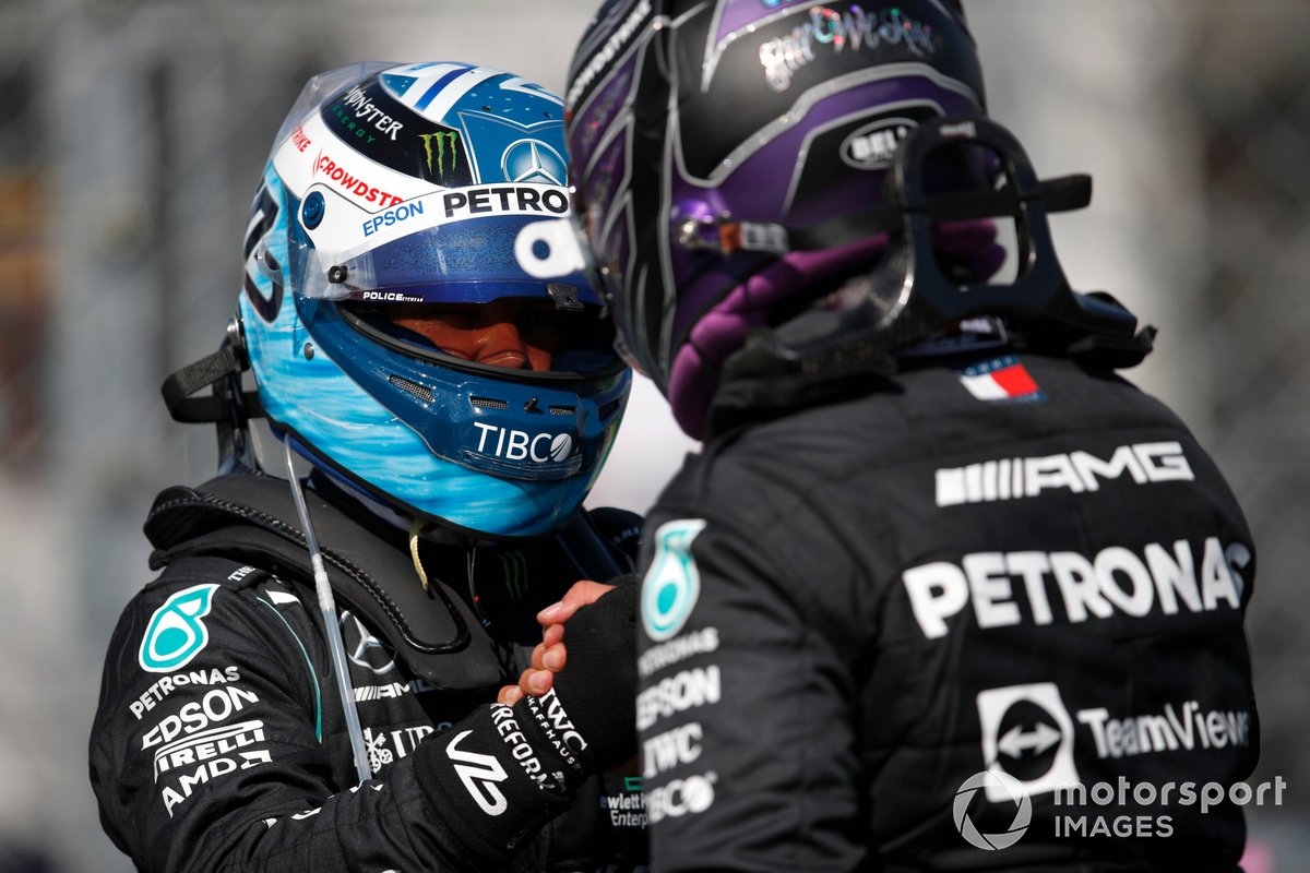 Pole man Lewis Hamilton, Mercedes, and Valtteri Bottas, Mercedes, congratulate each other after locking out the front row