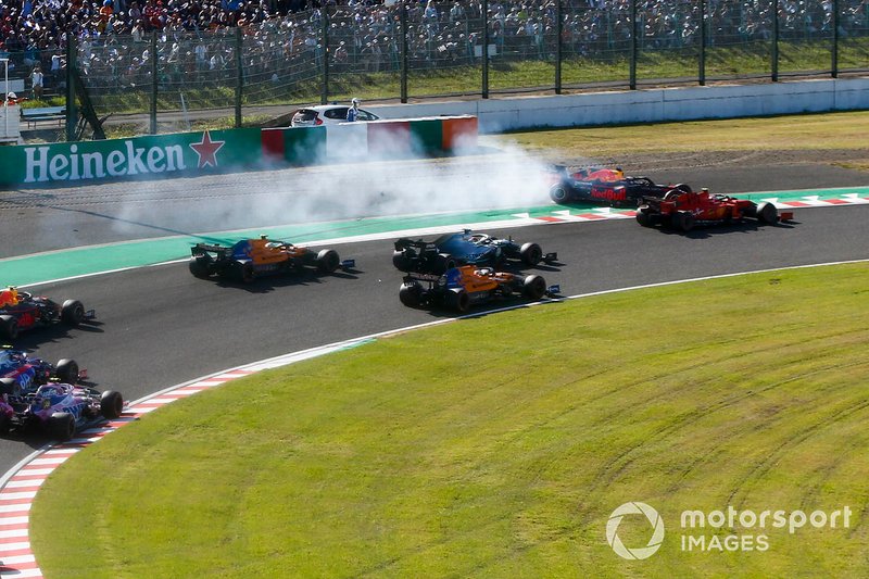 Max Verstappen, Red Bull Racing RB15 spins after making contact with Charles Leclerc, Ferrari SF90