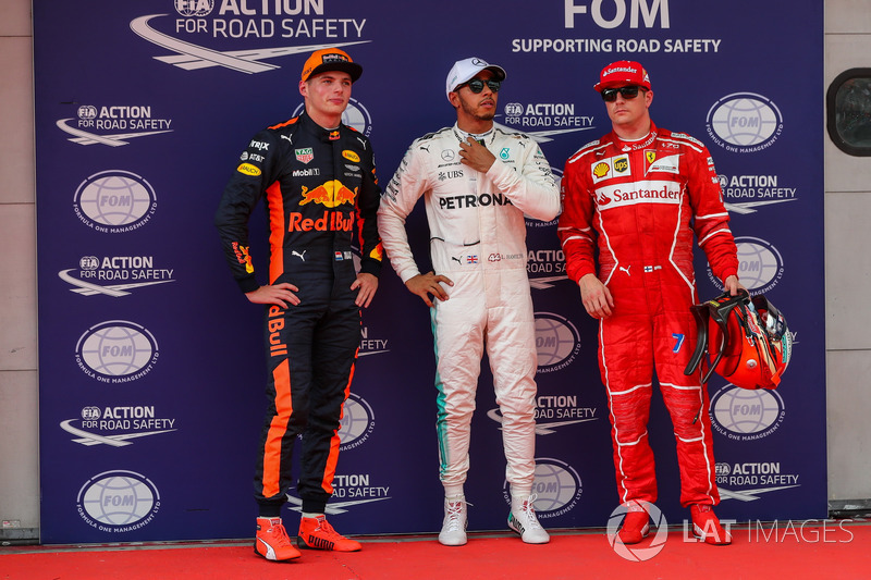 Pole sitter Lewis Hamilton, Mercedes AMG F1 celebrates in parc ferme, Max Verstappen, Red Bull Racing and Kimi Raikkonen, Ferrari