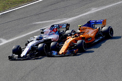 Lance Stroll, Williams FW41 ve Stoffel Vandoorne, McLaren MCL33