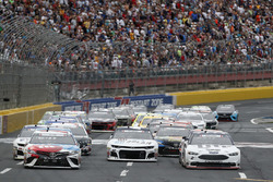 Brad Keselowski, Team Penske, Ford Fusion Stars, Stripes, and Lites Kyle Busch, Joe Gibbs Racing, Toyota Camry M&M's Red White & Blue